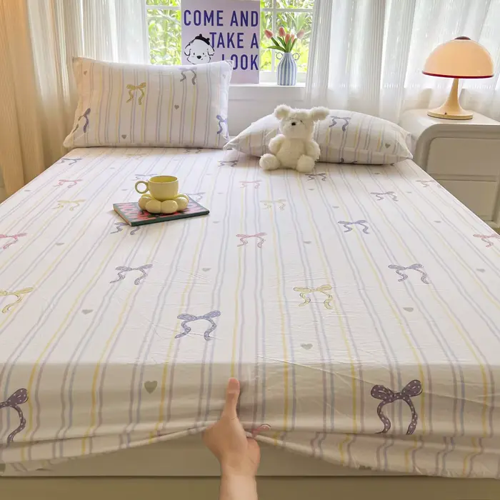 Ensemble de draps de lit à nœud rayé