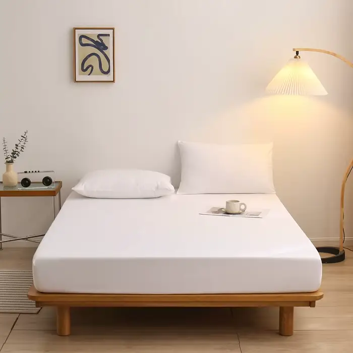 Drap-housse de couleur unie