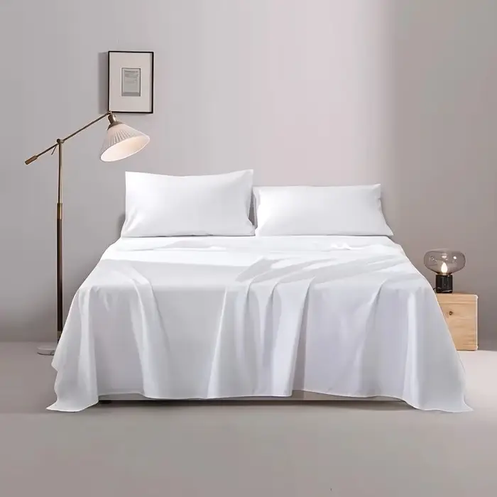 Un drap de lit simple (sans taie d'oreiller ou noyau), draps de lit simple ou double d'hôtel blanc p