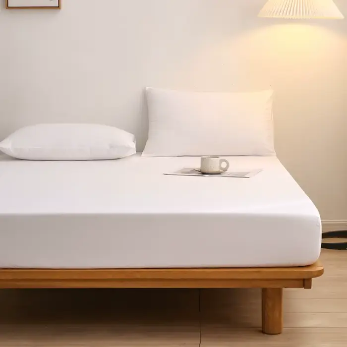 Drap-housse de couleur unie