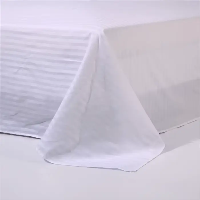 Drap de lit plat à rayures de couleur unie